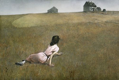 A woman lies in a dry field, reaching toward a distant farmhouse and barn