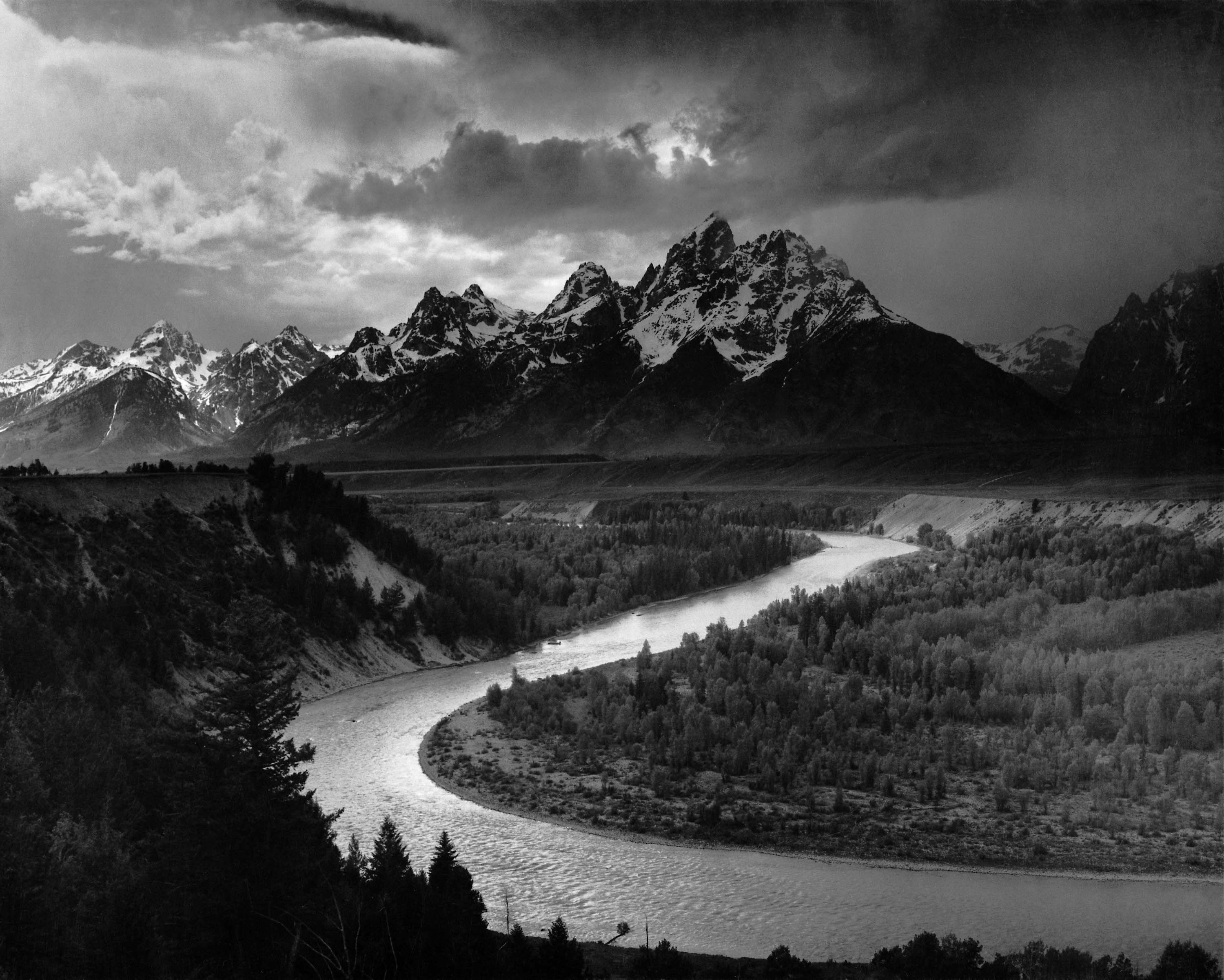 Ansel Adams, The Tetons and the Snake River: a winding river leads through dark trees toward snow-covered peaks